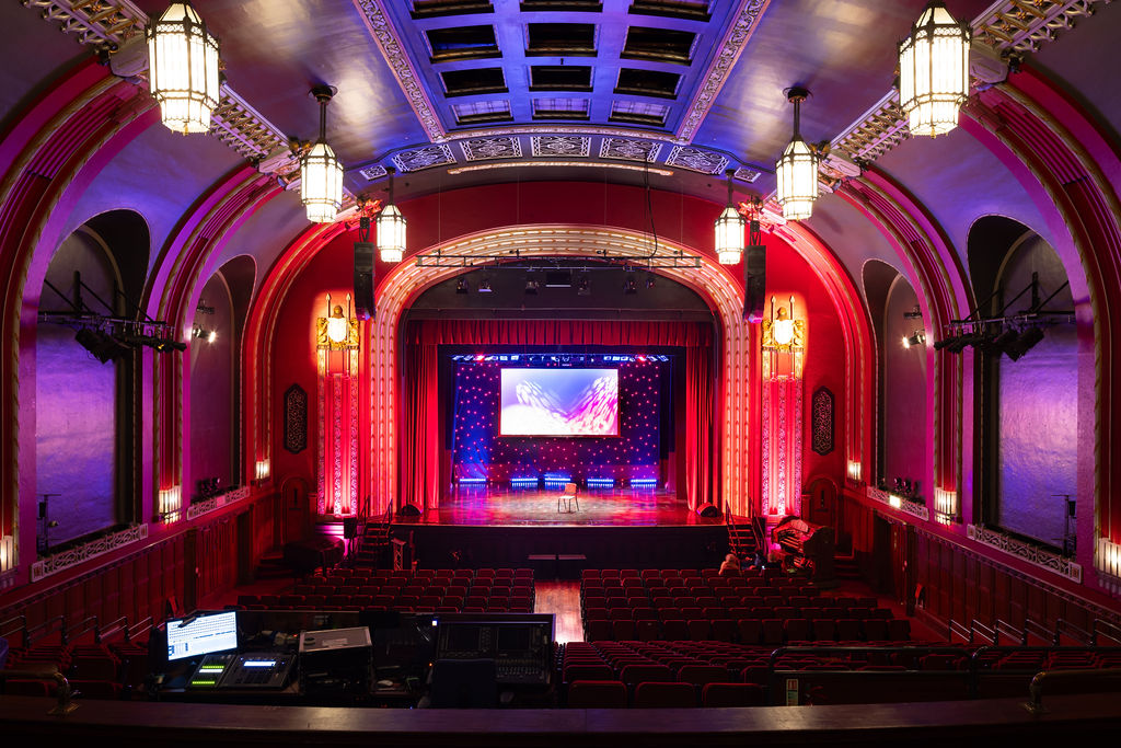 The Broadway Theatre in Catford has recently re-opened following a major refurbishment. The Grade ll* listed theatre closed during the Covid pandemic, and Lewisham Brough Council used this time to invest in key improvements, particularly improving accessibility to the theatre. The refurbishment works was designed by Purcell and carried out by Rooff and included upgraded seating and an overhaul for the main auditorium, a new bar area, decoration works and new digital signage on the outside of the building. New mechanical, electrical and fire alarm systems have been installed to help improve the Council’s carbon footprint and bring the facilities up to date. Accessibility improvements throughout the whole theatre means that performers are now able to access both eh stage and the dressing room areas, alongside better access for the public. Client: Lewisham Borough Council / London Borough of Lewisham. Architect: Purcell. Main Contractor: Rooff. Engineers: Integral Engineering Design. Theatre Designers: Charcoalblue